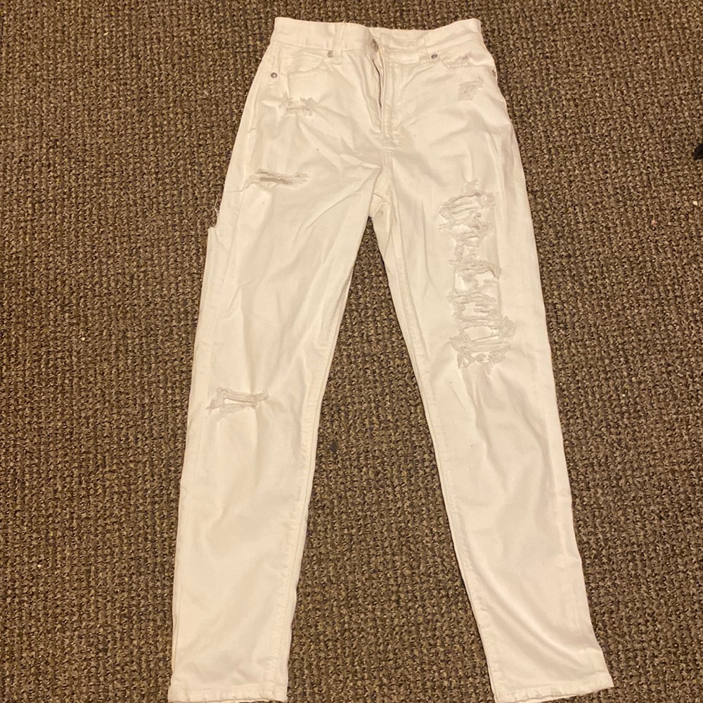 White American eagle jeans with trendy rip on the back